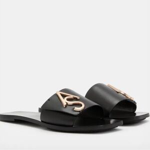 All Saints Black and Gold Sandals